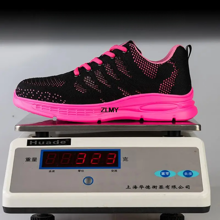 Chaussures sécurité femme noires professionnelles. Confort léger, embout acier et semelle anti-perforation.
