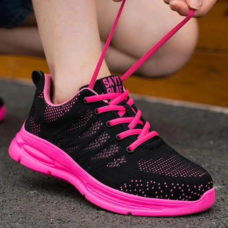 Chaussures sécurité femme résistantes, protection anti-perforation et embout acier pour le travail quotidien.