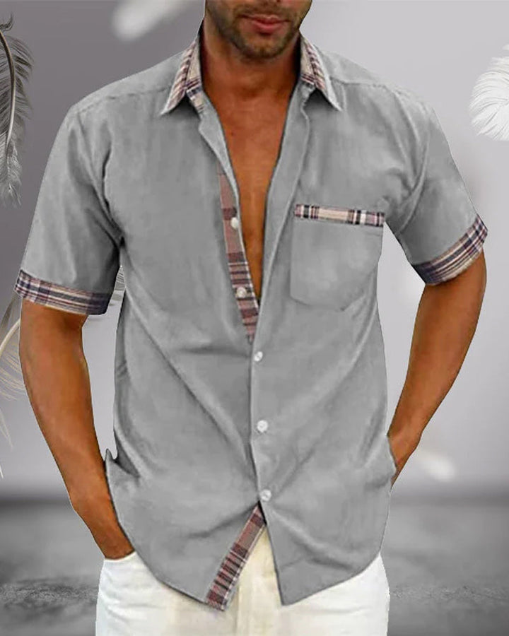 "Chemise à manches courtes homme élégante, motif intemporel, coupe ajustée, plusieurs couleurs, confort et style raffinés."