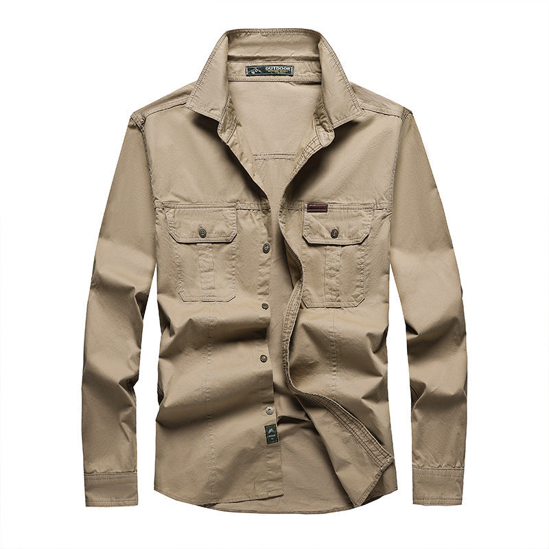 Chemise cargo homme ample avec poches poitrine et manches longues, idéale pour le confort et le travail.