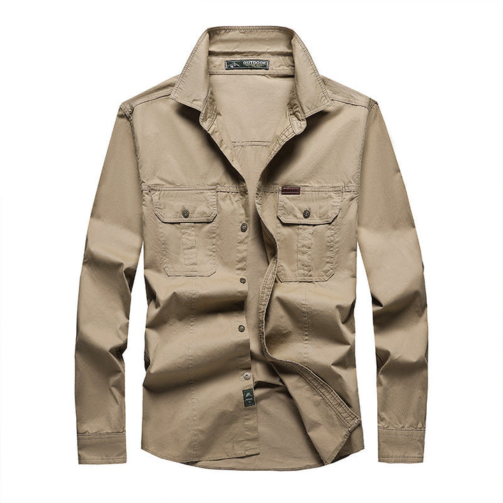 Chemise cargo homme ample avec poches poitrine et manches longues, idéale pour le confort et le travail.