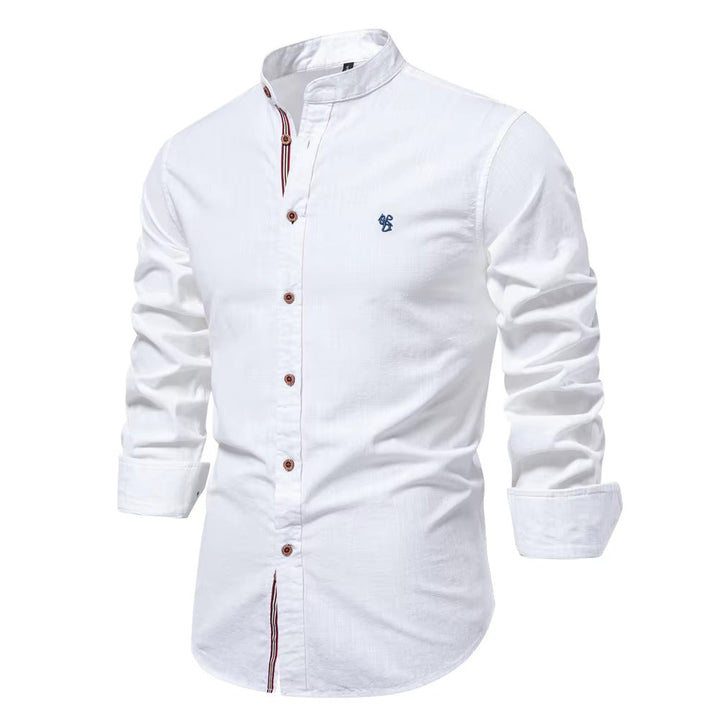 Chemise col Mao coton, élégante et moderne. Coupe ajustée,  détails soignés.  Parfait pour un look chic.