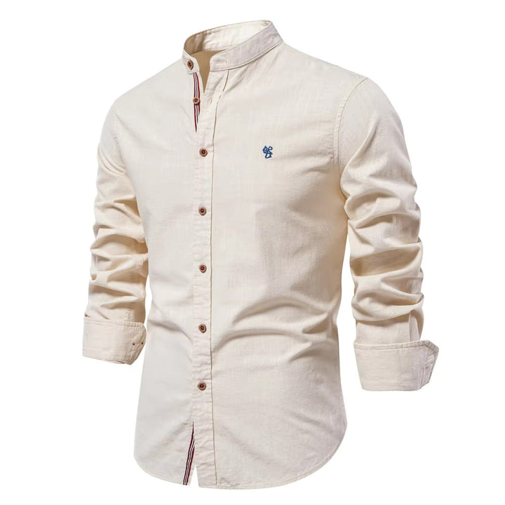 Chemise col Mao coton, élégante et moderne. Coupe ajustée,  détails soignés.  Parfait pour un look chic.