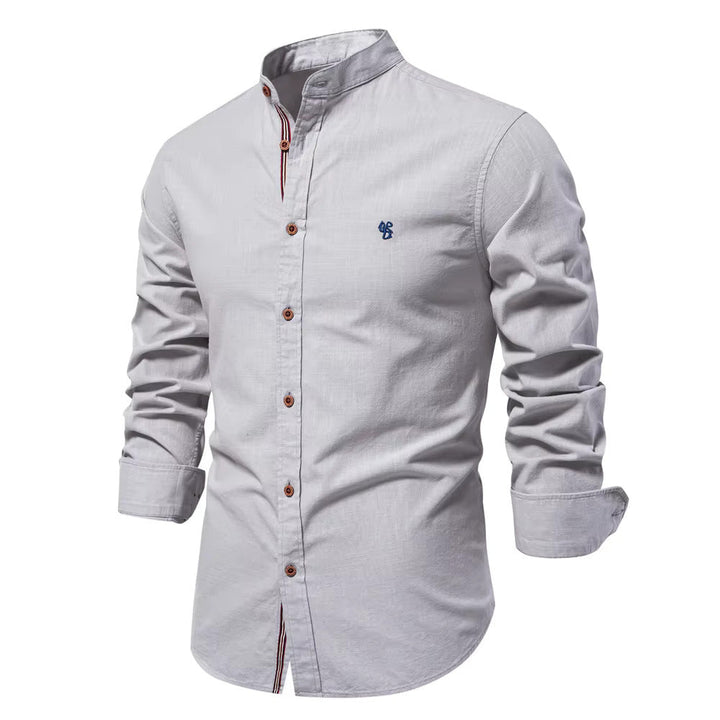 Chemise col Mao coton, élégante et moderne. Coupe ajustée,  détails soignés.  Parfait pour un look chic.