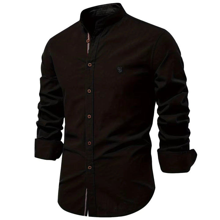 Chemise col Mao coton, élégante et moderne. Coupe ajustée,  détails soignés.  Parfait pour un look chic.