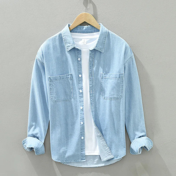 Chemise denim homme, coupe classique. Denim robuste, coton de qualité.  Style intemporel, parfait pour toutes occasions.