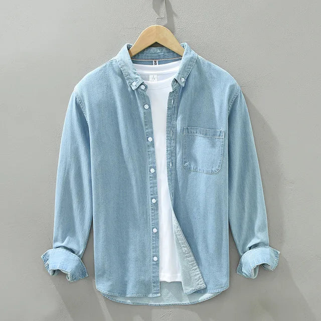Chemise denim homme, coupe classique. Denim robuste, coton de qualité.  Style intemporel, parfait pour toutes occasions.