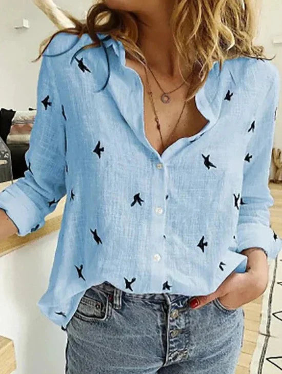 Chemise élégante à manches longues, coupe décontractée et féminine.  Tissu doux, idéale pour le bureau ou les sorties.