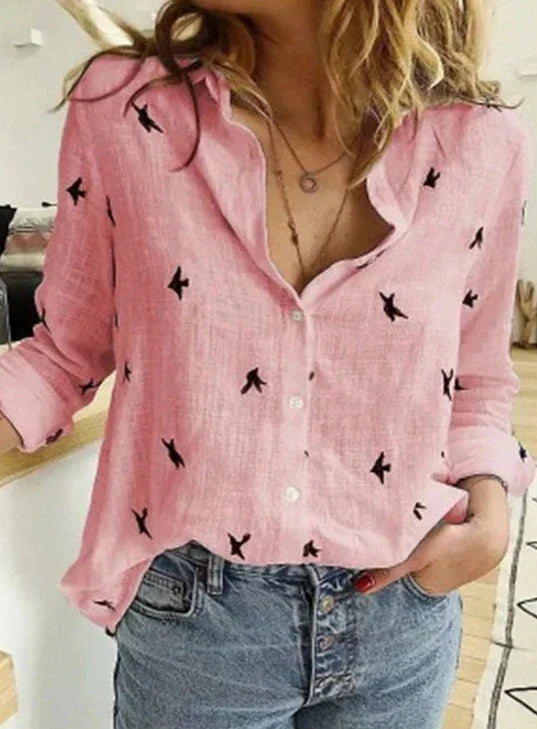 Chemise élégante à manches longues, coupe décontractée et féminine.  Tissu doux, idéale pour le bureau ou les sorties.