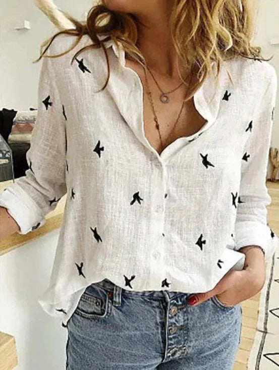 Chemise élégante à manches longues, coupe décontractée et féminine.  Tissu doux, idéale pour le bureau ou les sorties.