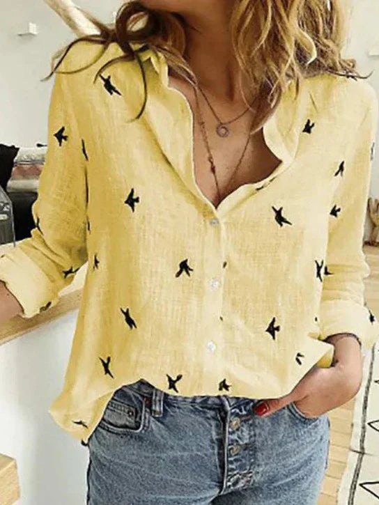 Chemise élégante à manches longues, coupe décontractée et féminine.  Tissu doux, idéale pour le bureau ou les sorties.