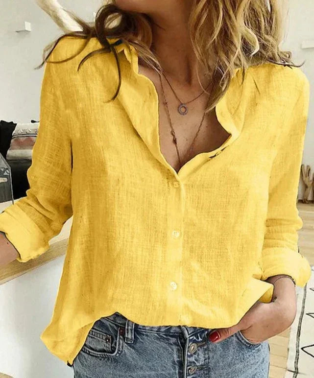 Chemise élégante à manches longues, coupe décontractée et féminine.  Tissu doux, idéale pour le bureau ou les sorties.