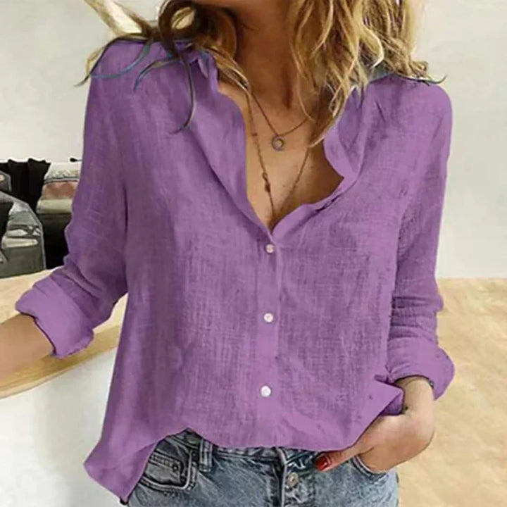 Chemise élégante à manches longues, coupe décontractée et féminine.  Tissu doux, idéale pour le bureau ou les sorties.