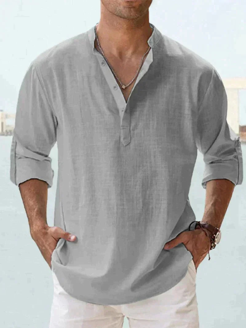"Chemise en lin bleu marine pour homme, élégante et décontractée, idéale pour un confort estival."
