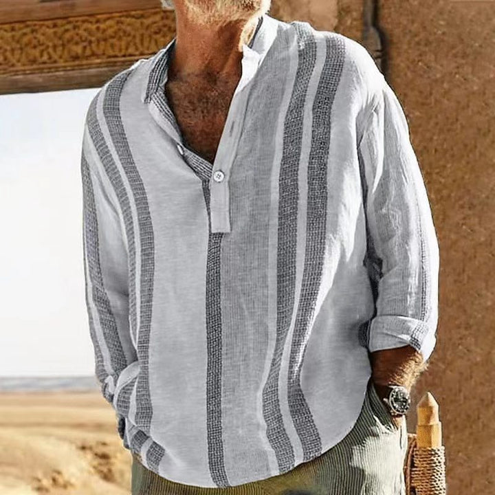Chemise en lin pour homme avec rayures élégantes et col grand-père moderne, idéale pour un style raffiné et confortable.