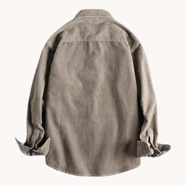 "Chemise en velours côtelé orange pour homme, texture côtelée et poche poitrine, polyvalente et résistante."