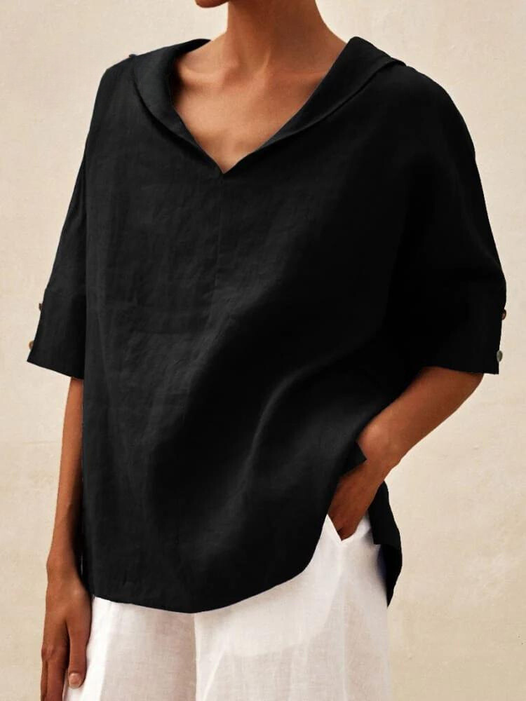 Chemise femme col V, coupe décontractée et élégante.  Tissu fluide et confortable.