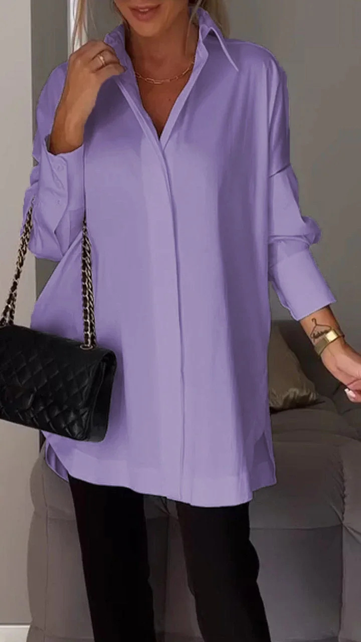 Blouse femme tendance et polyvalente, style oversize, manches retroussées pour printemps-été.