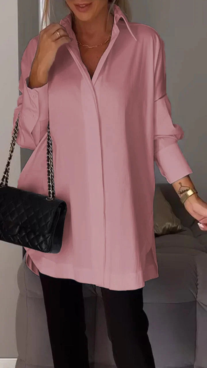 Chemise femme chic et confortable, coupe oversize à manches retroussées, parfaite mode décontractée.