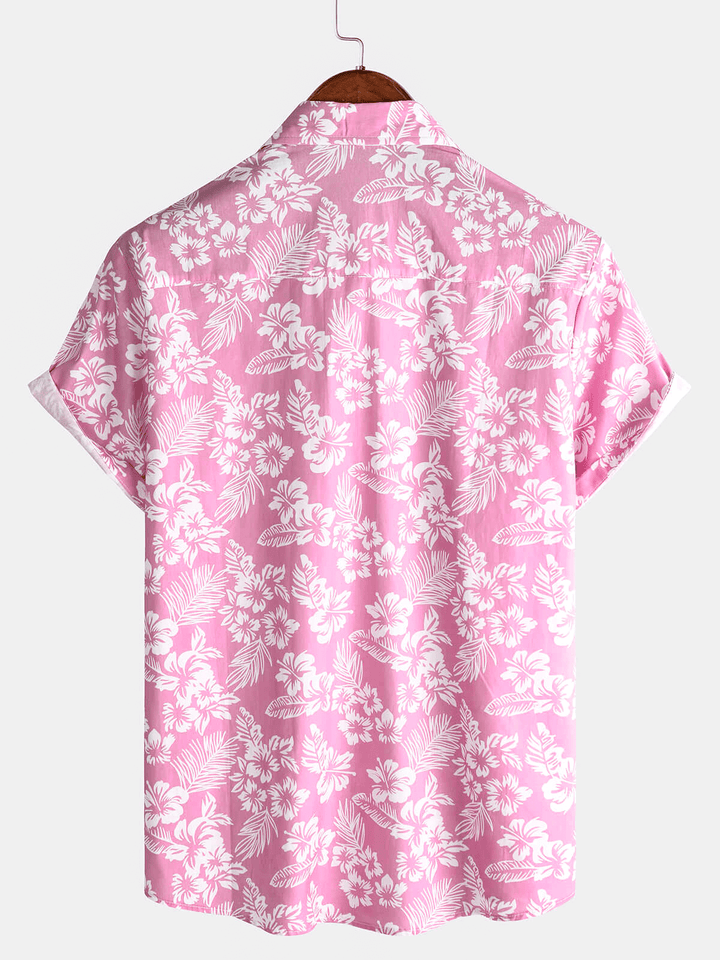 Chemise homme fluide et aérée, motif floral tropical, idéale pour la chaleur estivale et le style décontracté.