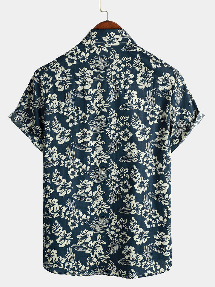 Chemise homme à manches courtes, style hawaïen décontracté, motifs tropicaux, confort estival.