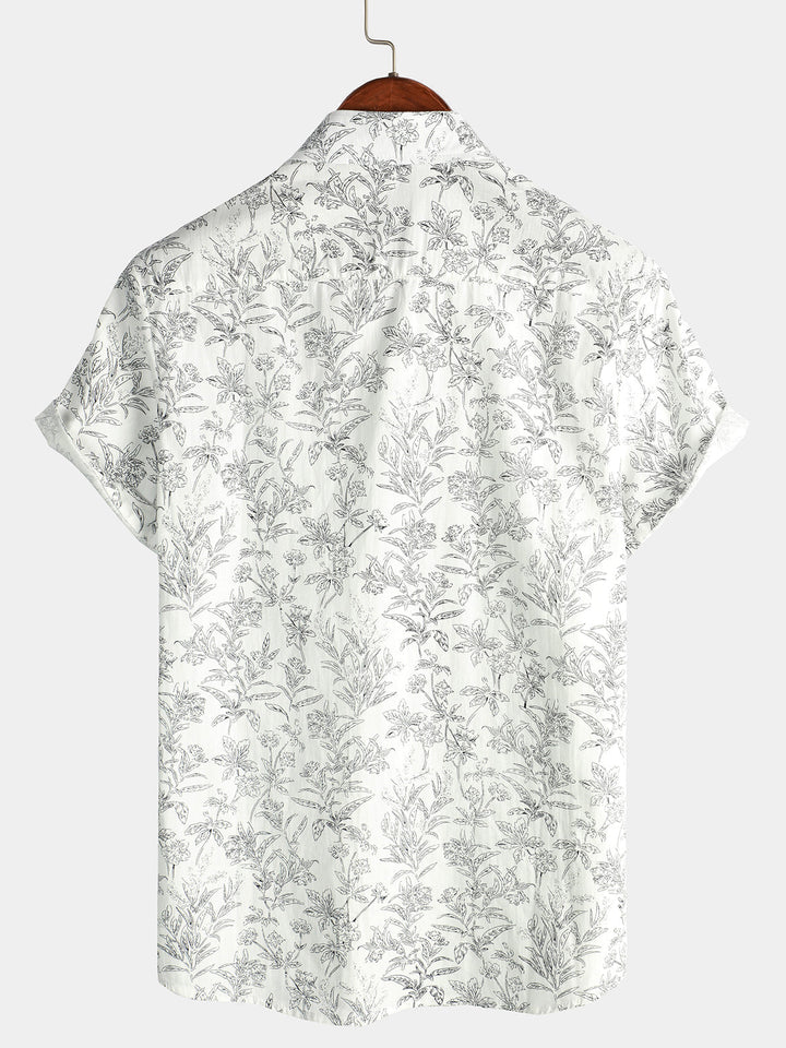 Chemise hawaïenne homme, tissu léger et respirant, motifs floraux tropicaux, style plage.