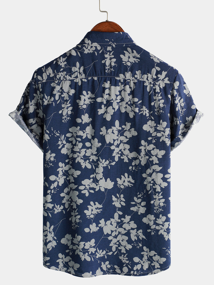 Chemise tropicale homme aux couleurs vives, manches courtes, parfaite pour un look décontracté d'été.