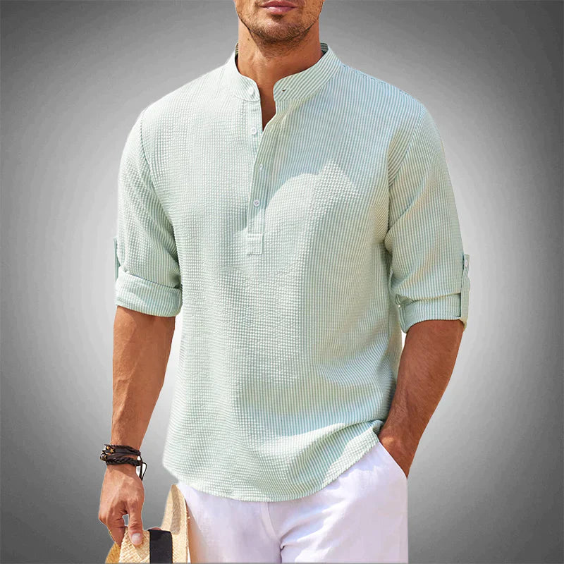 Chemise homme Henley en coton respirant, coupe classique à manches longues, pour un confort et une élégance intemporels.
