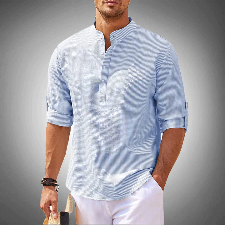 Chemise homme à manches longues Henley, confortable et durable, parfaite pour le quotidien et la mode décontractée.