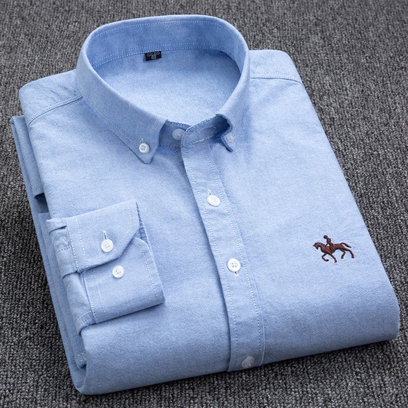 "Chemise homme élégante blanche, bleu, rose, turquoise, design chic, tissu respirant, idéale pour toute occasion."