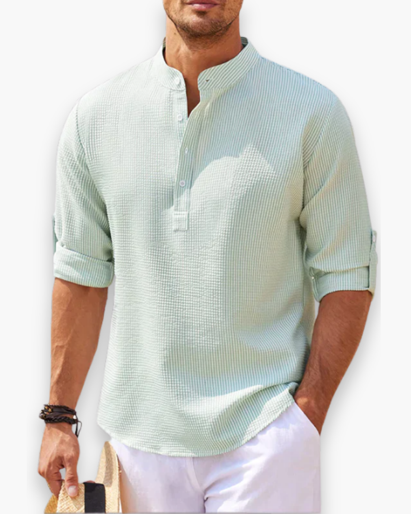 "Chemise homme élégante col mao, look décontracté moderne, tissu respirant, manches longues, modèle bleu."