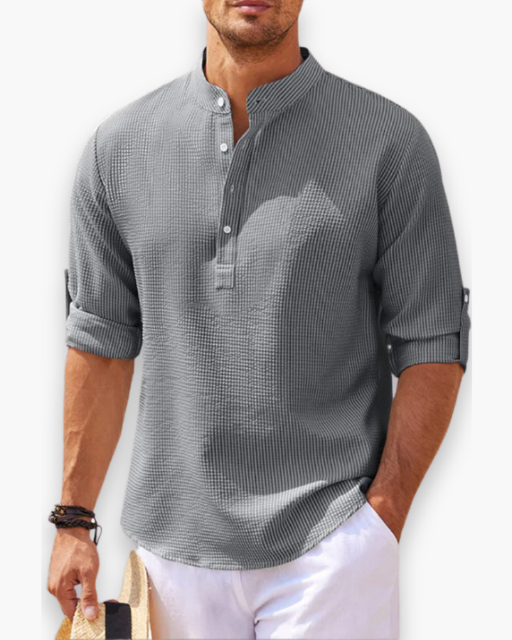 "Chemise homme élégante col mao, look décontracté moderne, tissu respirant, manches longues, modèle bleu."