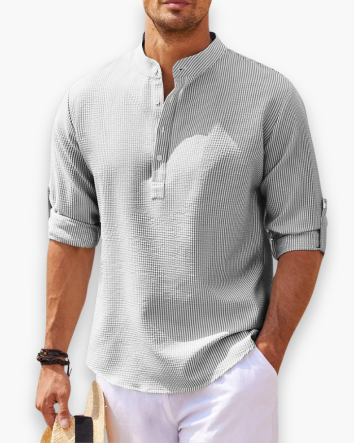 "Chemise homme élégante col mao, look décontracté moderne, tissu respirant, manches longues, modèle bleu."