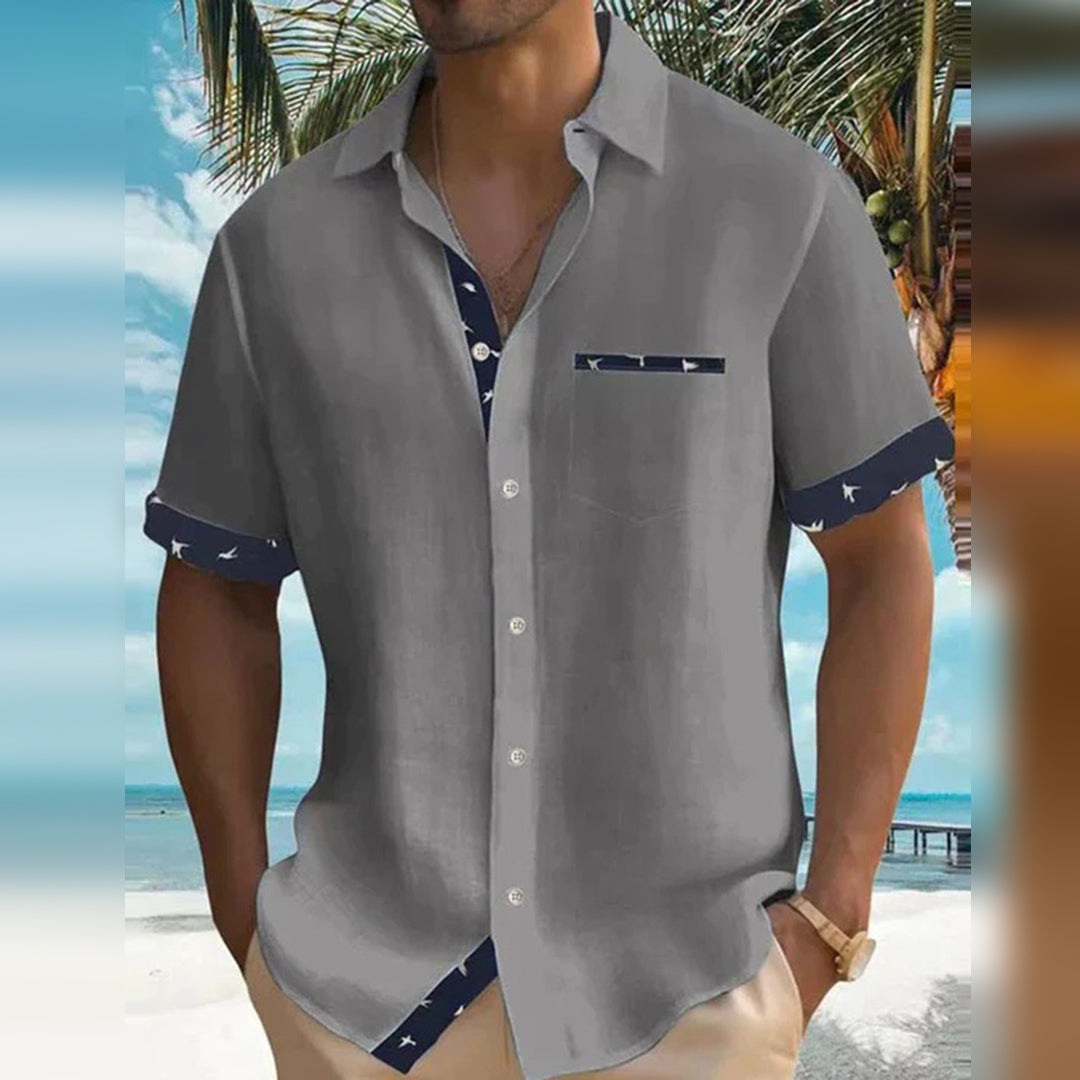 "Chemise homme élégante gris manches courtes, coton doux, détails contrastés, idéale tenue casual ou semi-formelle printemps 