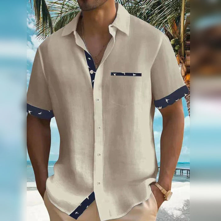 "Chemise homme élégante gris manches courtes, coton doux, détails contrastés, idéale tenue casual ou semi-formelle printemps 