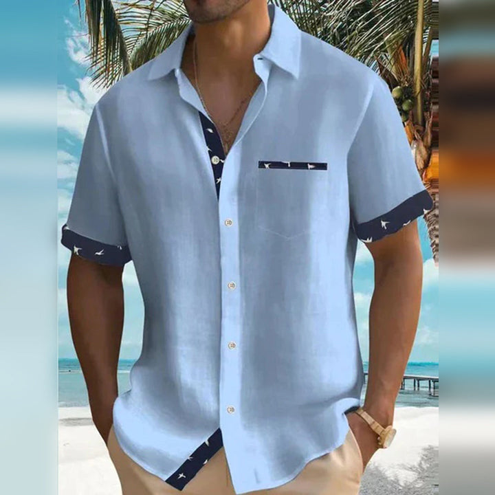 "Chemise homme élégante gris manches courtes, coton doux, détails contrastés, idéale tenue casual ou semi-formelle printemps 