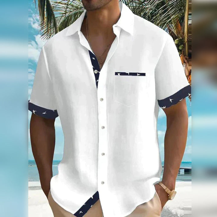"Chemise homme élégante gris manches courtes, coton doux, détails contrastés, idéale tenue casual ou semi-formelle printemps 