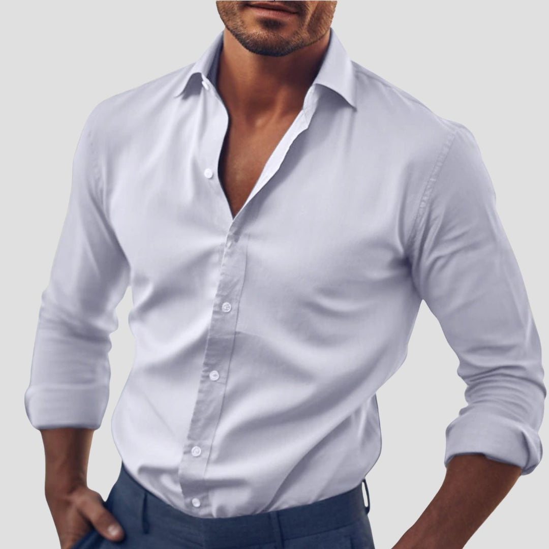 "Chemise homme en coton élégant avec coupe cintrée, col italien semi-ouvert et poignets ajustables."