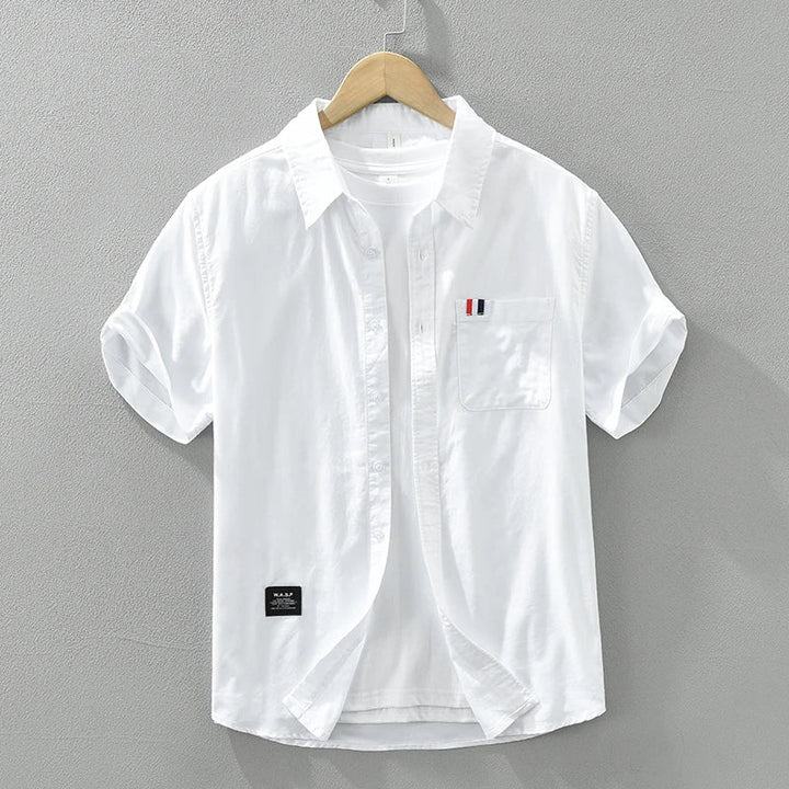 Chemise homme en coton, manches courtes, élégante, coupe moderne, couleur noir, bleu, gris ou blanc, style polyvalent.