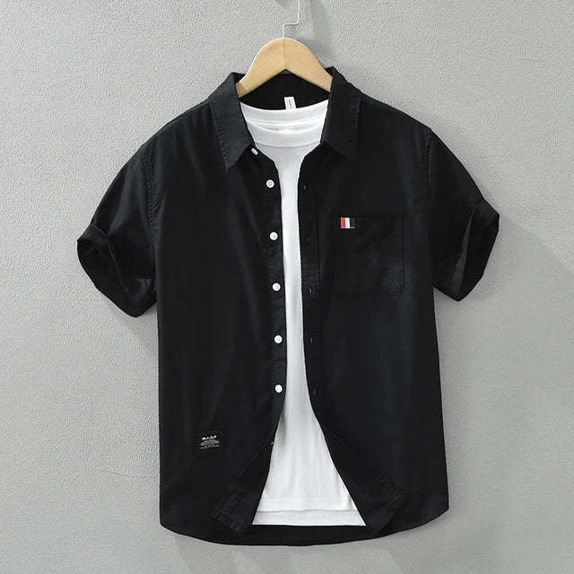 Chemise homme en coton, manches courtes, élégante, coupe moderne, couleur noir, bleu, gris ou blanc, style polyvalent.