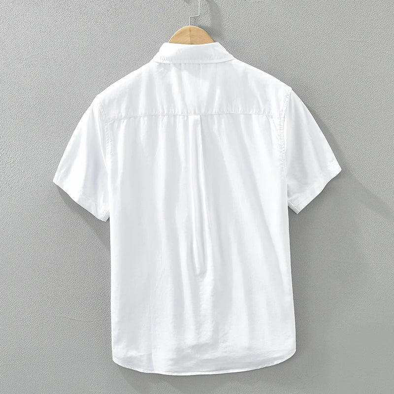 Chemise homme en coton, manches courtes, élégante, coupe moderne, couleur noir, bleu, gris ou blanc, style polyvalent.
