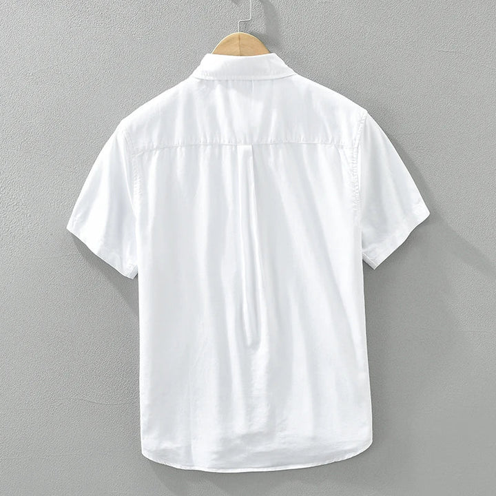 Chemise homme en coton, manches courtes, élégante, coupe moderne, couleur noir, bleu, gris ou blanc, style polyvalent.