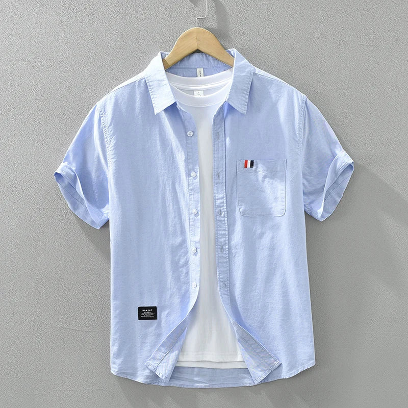 Chemise homme en coton, manches courtes, élégante, coupe moderne, couleur noir, bleu, gris ou blanc, style polyvalent.