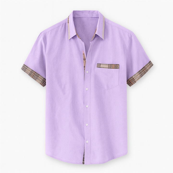 Chemise homme chic et polyvalente, manches courtes, parfaite pour un look élégant ou décontracté.