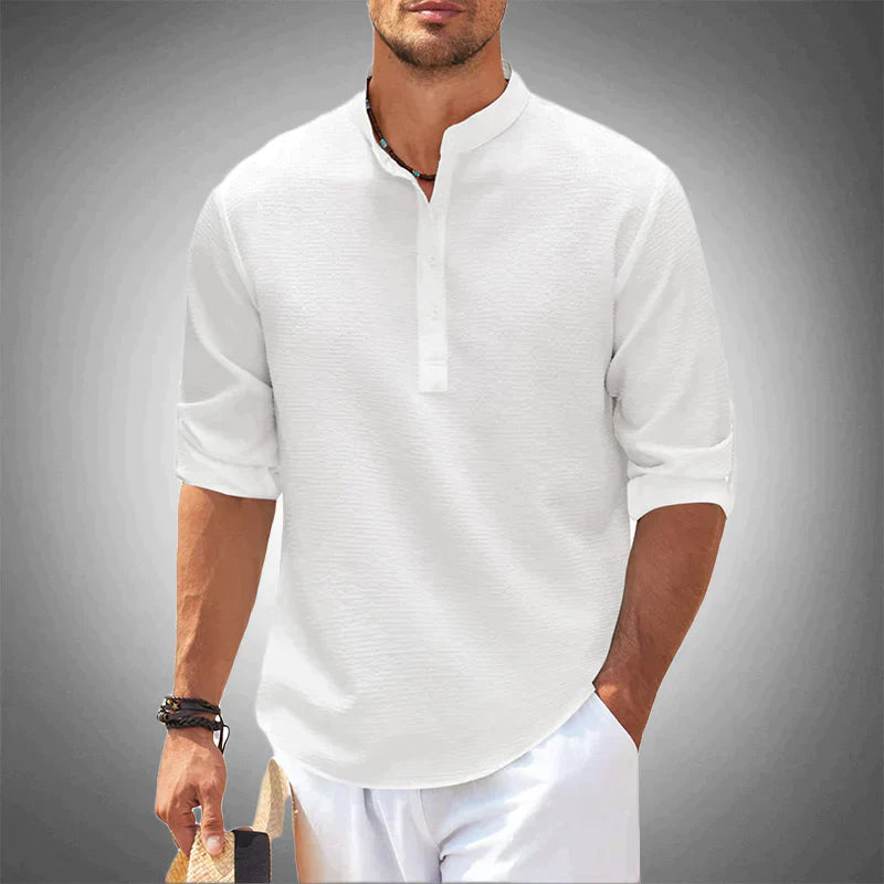 Chemise homme manches longues, coupe classique, confort optimal.