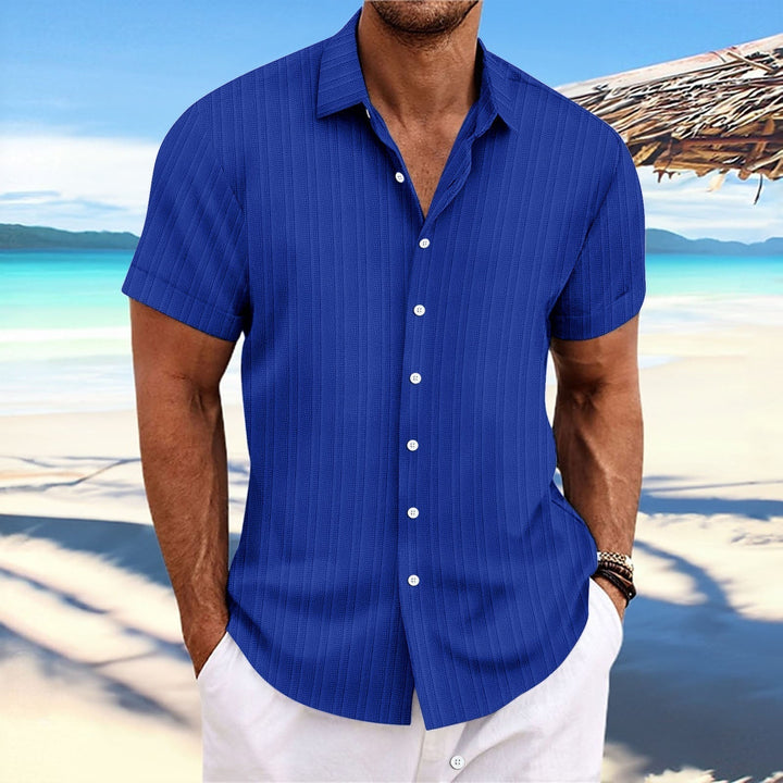 Chemise rayée homme en coton et lin, élégante et intemporelle, parfaite pour un look classique et confortable.
