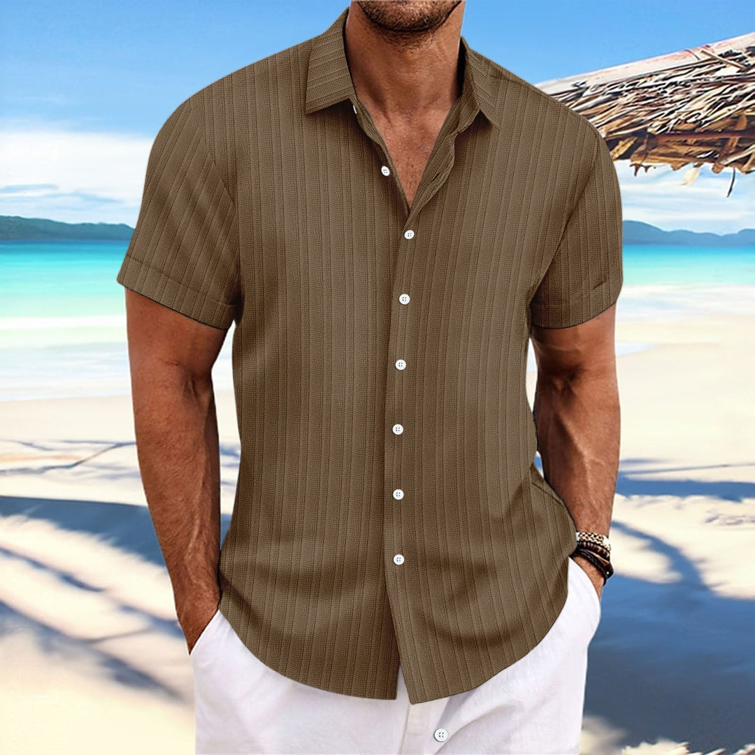 Chemise rayée homme en coton et lin, élégante et intemporelle, parfaite pour un look classique et confortable.