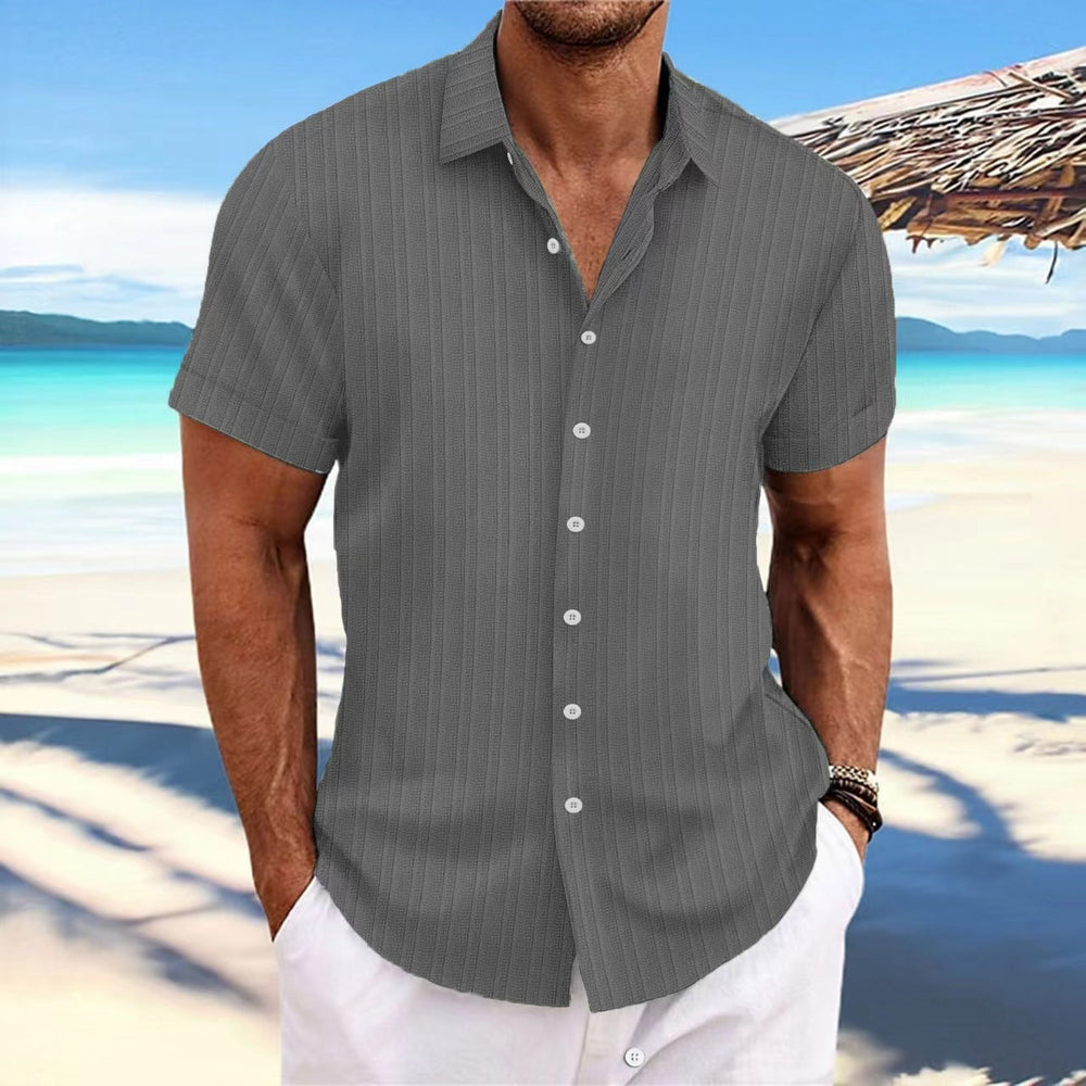 Chemise rayée homme en coton et lin, élégante et intemporelle, parfaite pour un look classique et confortable.