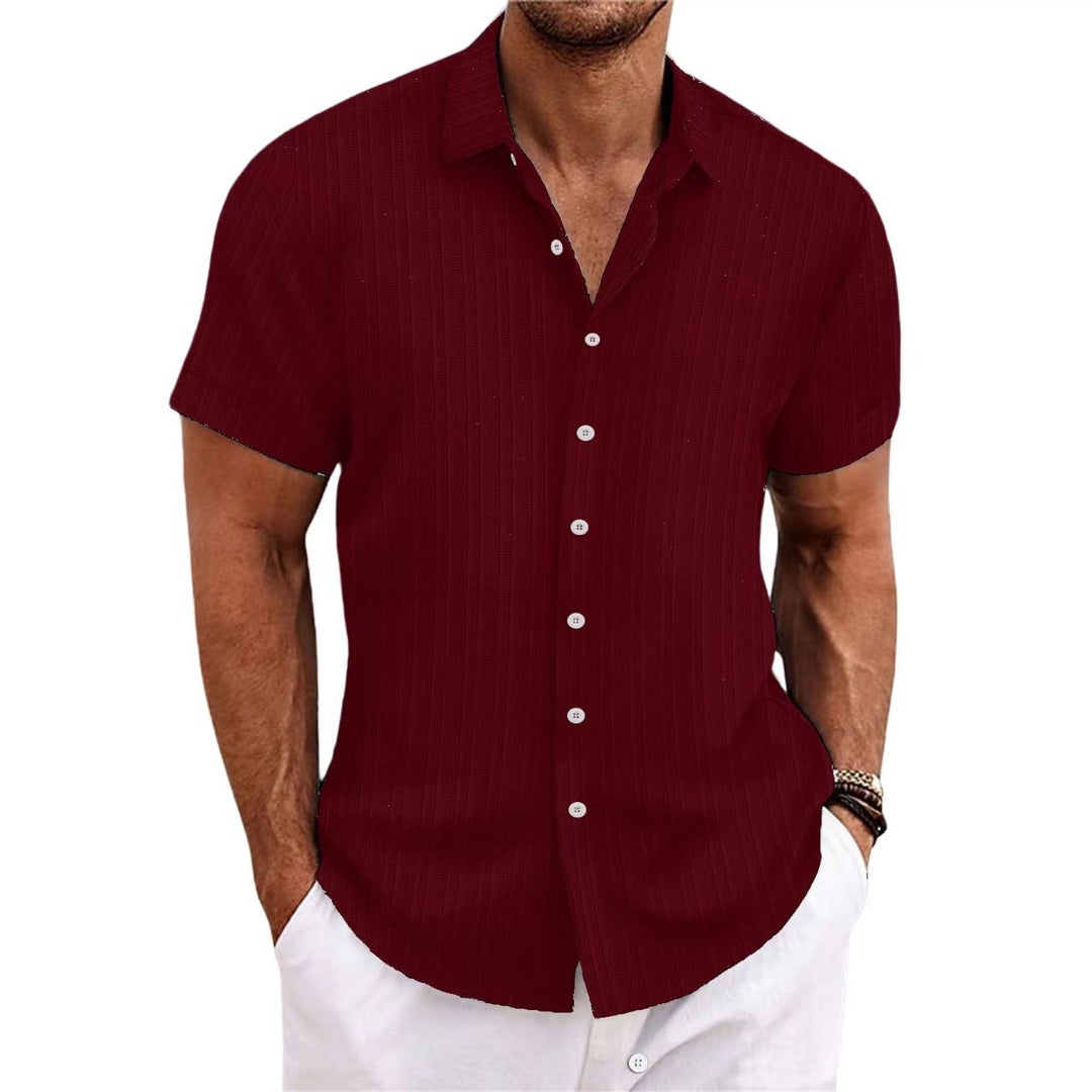 Chemise rayée homme en coton et lin, élégante et intemporelle, parfaite pour un look classique et confortable.