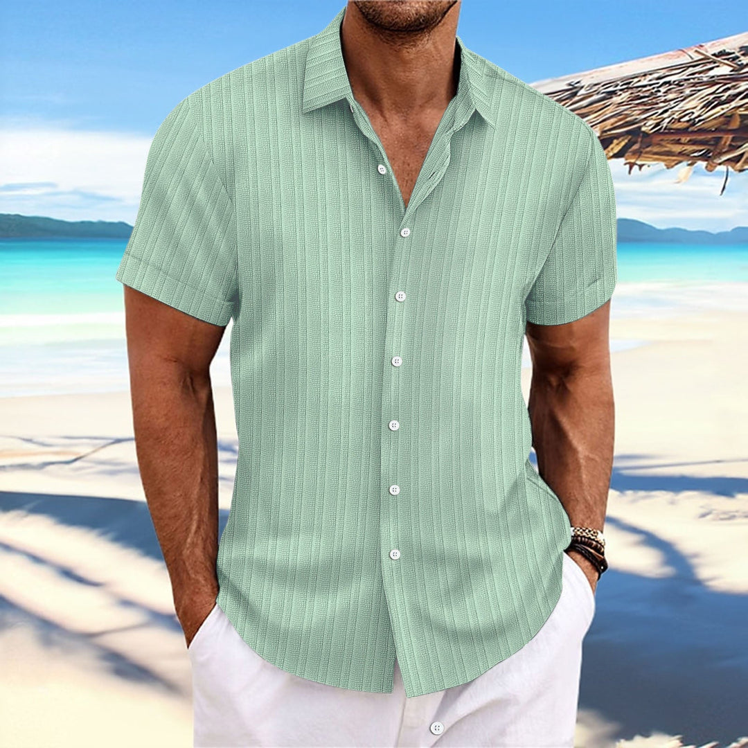 Chemise rayée homme en coton et lin, élégante et intemporelle, parfaite pour un look classique et confortable.